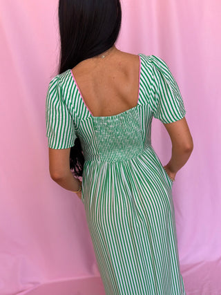 woman wearing green dress