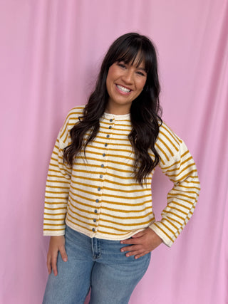 girl wearing a striped cardigan