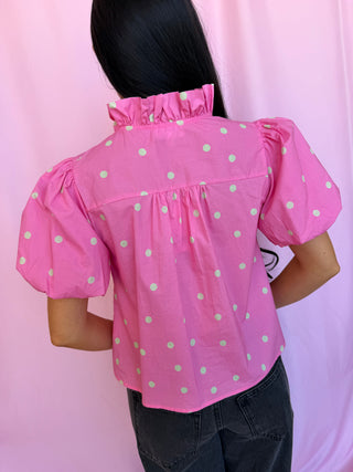 woman wearing polka dot top