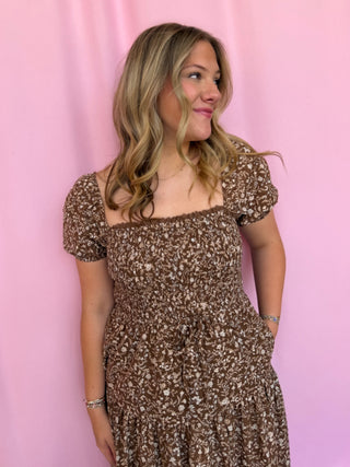 girl wearing brown dress