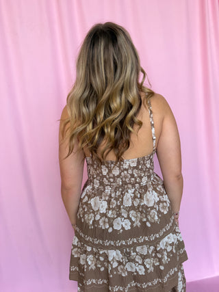 girl wearing a floral dress