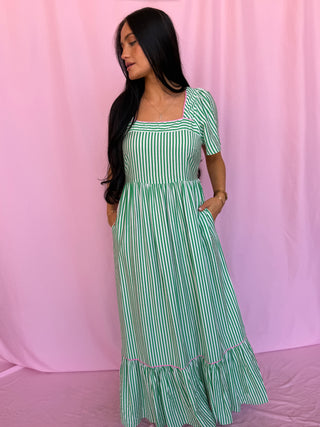 woman wearing green dress