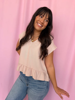 girl wearing a pink top