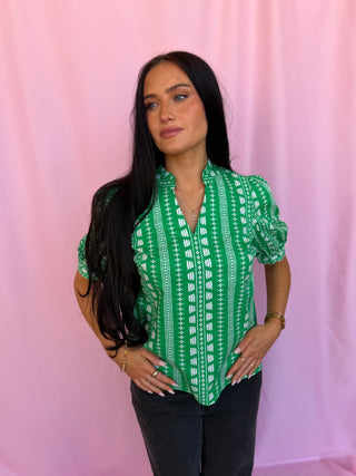 woman wearing green top 