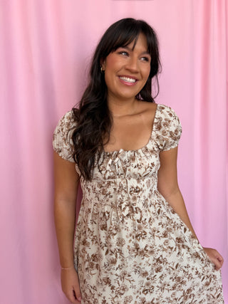 girl wearing brown dress