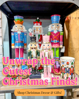 Colorful nutcrackers on a table with promotional text overlay.