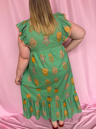 woman wearing green dress