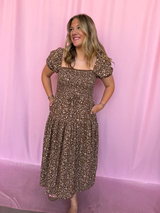 girl wearing brown dress