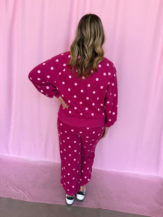 girl wearing a polka dot set 