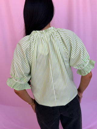 woman wearing polka dot top