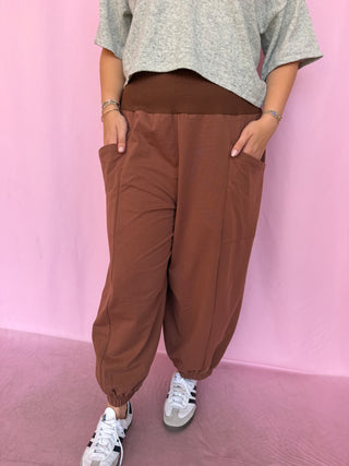 girl wearing brown pants