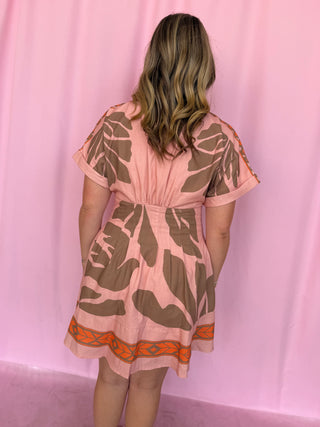 girl wearing a pink dress
