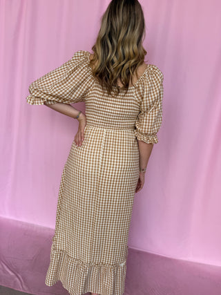 girl wearing gingham dress