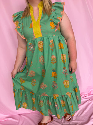 woman wearing green dress