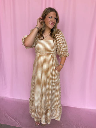 girl wearing gingham dress