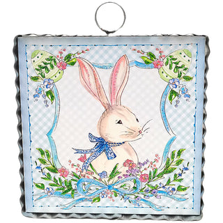 Decorative panel with a rabbit illustration and floral elements on a white background