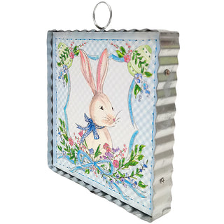 Decorative metal sign with a rabbit illustration on a white background