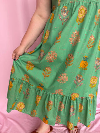 woman wearing green dress