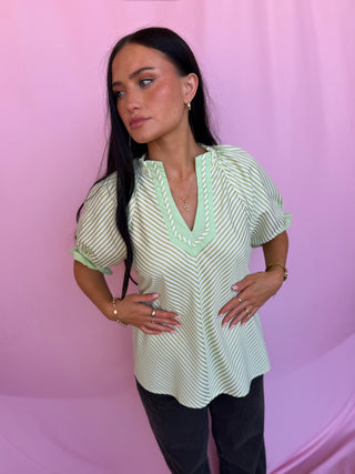 woman wearing polka dot top