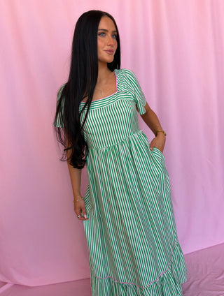 woman wearing green dress