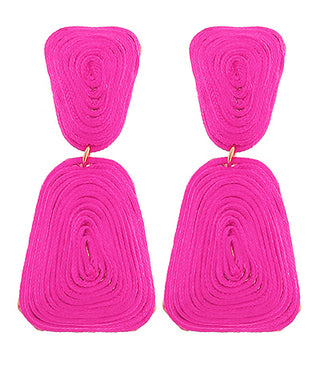 Pair of bright pink earrings with a spiral design on a white background