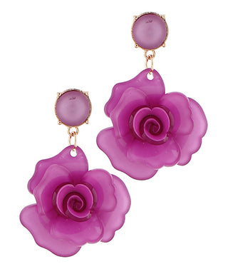 Purple rose-shaped earrings on a white background