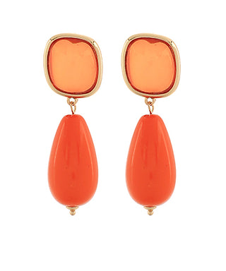 Orange earrings with gold accents on a white background