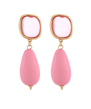 Pink earrings with gold accents on a white background