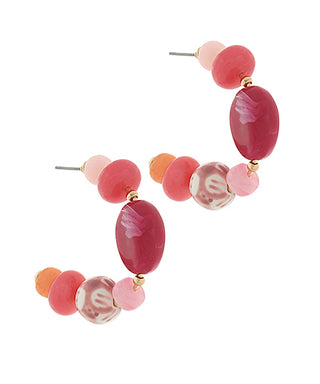Multicolored beaded earrings on a white background