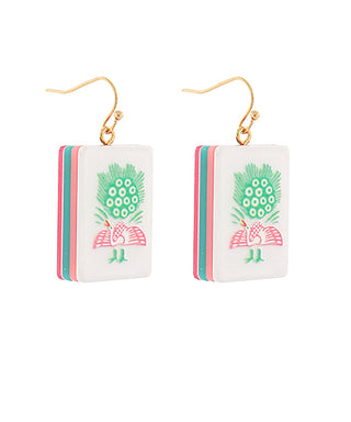 Pair of earrings with pineapple design on a white background