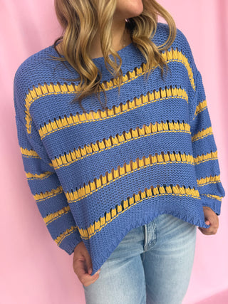 girl wearing a striped sweater 