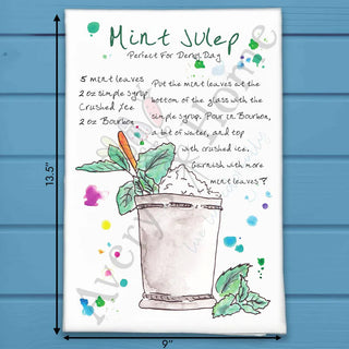 Tea towel with mint julep recipe on a blue wooden background