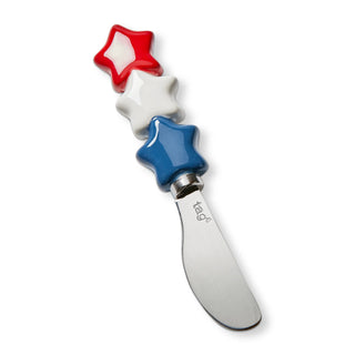 Decorative knife with red, white, and blue star handles on a white background