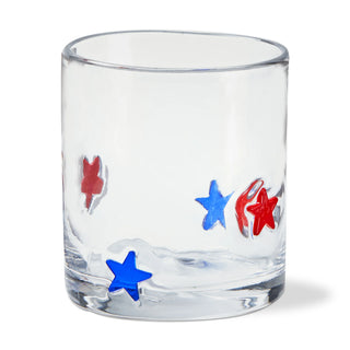 Clear glass with red and blue star designs on a white background