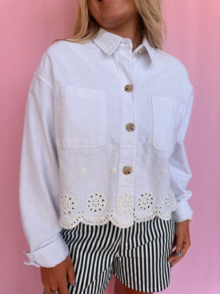 Woman wearing a white jacket