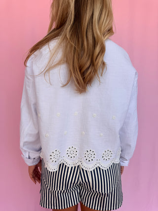 Woman wearing a white jacket