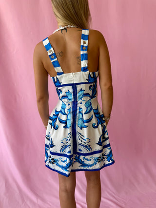 blue and white patterned mini dress