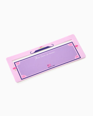 Pink and purple rectangular product with text on a white background