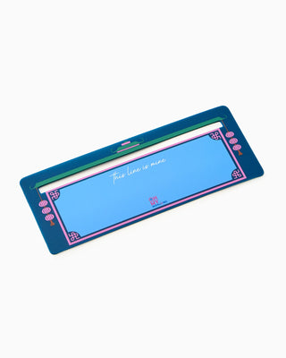 Blue electronic device with pink accents on a white background
