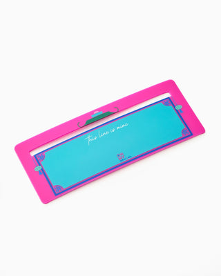 Pink and blue rectangular object with text on a white background