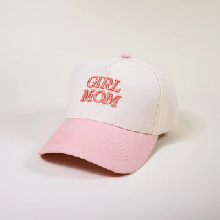 Pink and white cap with 'Girl Mom' text on a light gray background