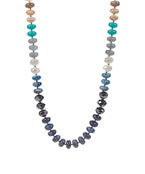 Necklace with multicolored beads on a white background