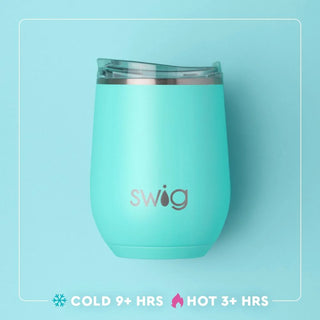 A mint green insulated stemless wine tumbler with a clear lid and the 'swig' logo printed on the front, set against a light blue background with promotional text at the bottom.