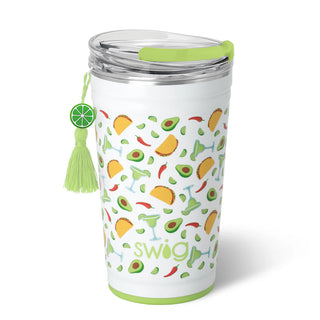 Clear tumbler with green lid and colorful pattern on a white background