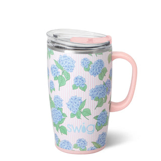Floral-patterned mug with pink handle on a white background