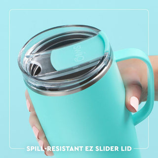 Turquoise tumbler with a spill-resistant EZ slider lid on a light blue background