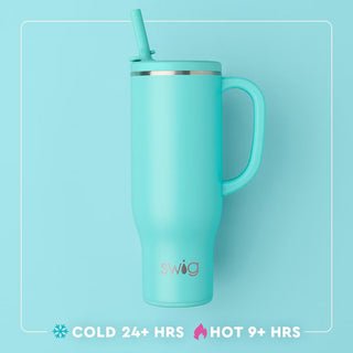 Turquoise mug with handle and straw on a light blue background, featuring the Swig brand.