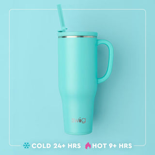 Turquoise mug with handle and straw on a light blue background, featuring the Swig brand.