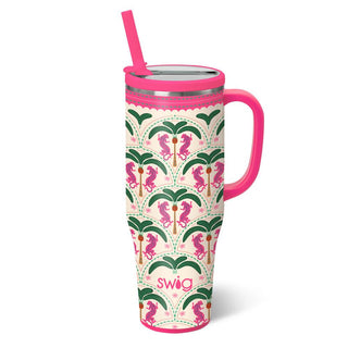 Tumbler with pink handle and mermaid pattern on a white background