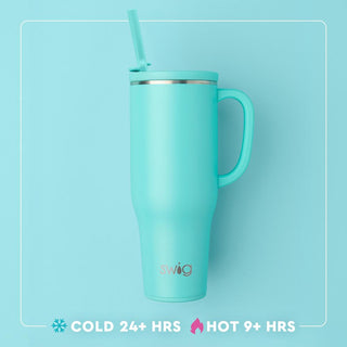 Turquoise mug with handle and straw on a light blue background, featuring the Swig brand.